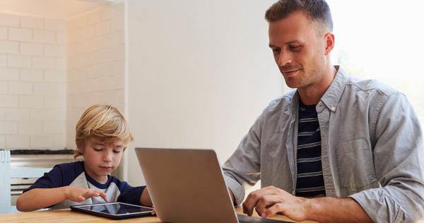 father working at home and keeping son occupied